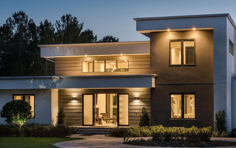 Control4 Touch panel in a able with a traditional home in the background